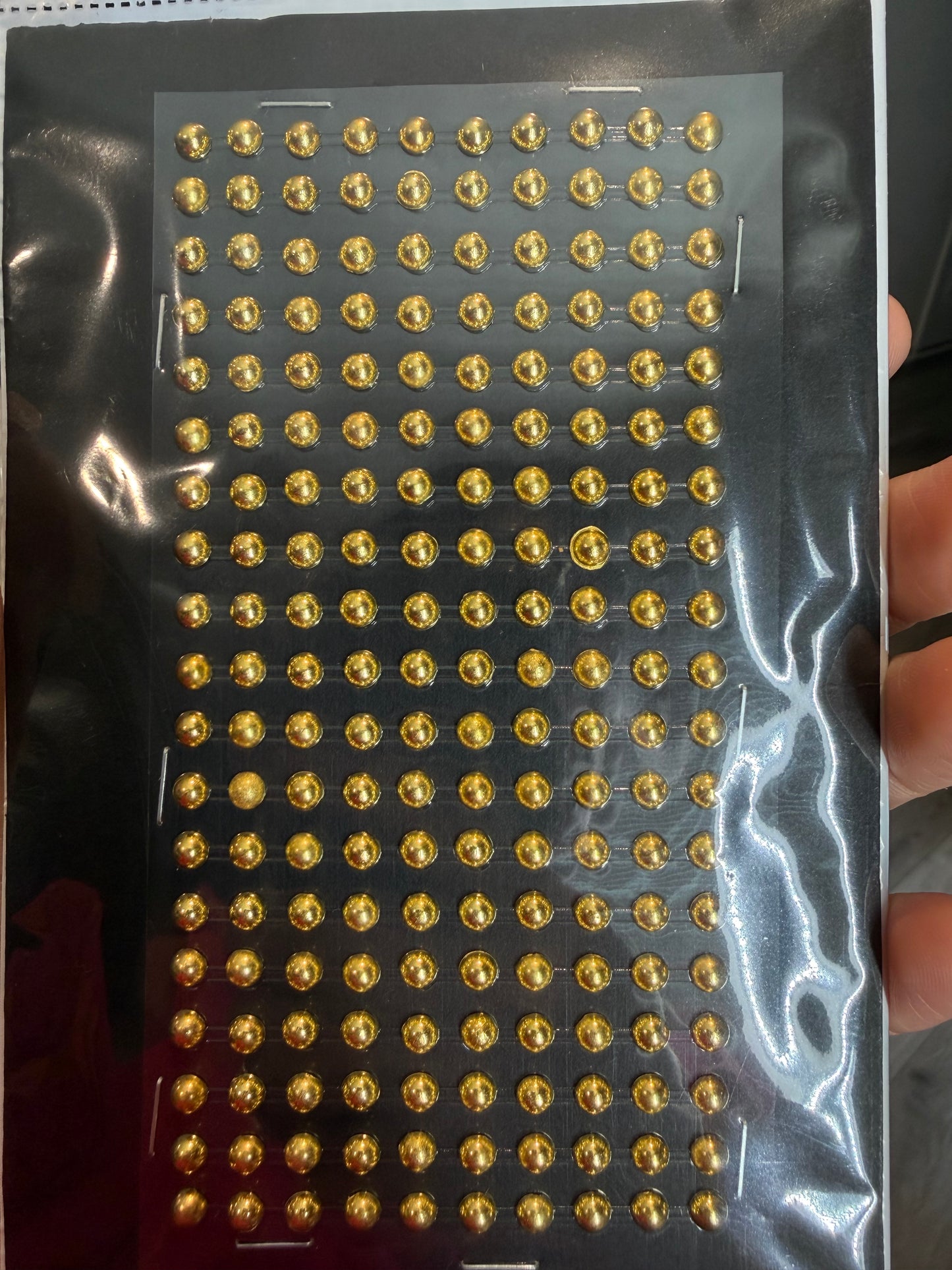Sticky golden pearls