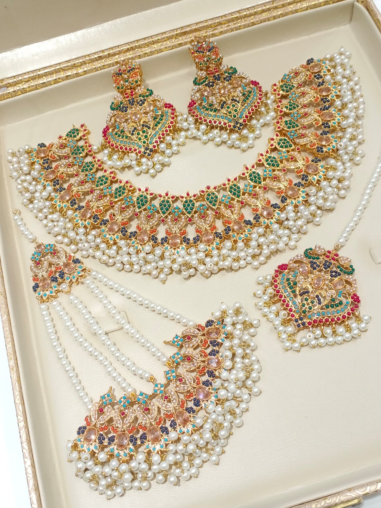 Nauratan set with jhoomer, earrings and tikka