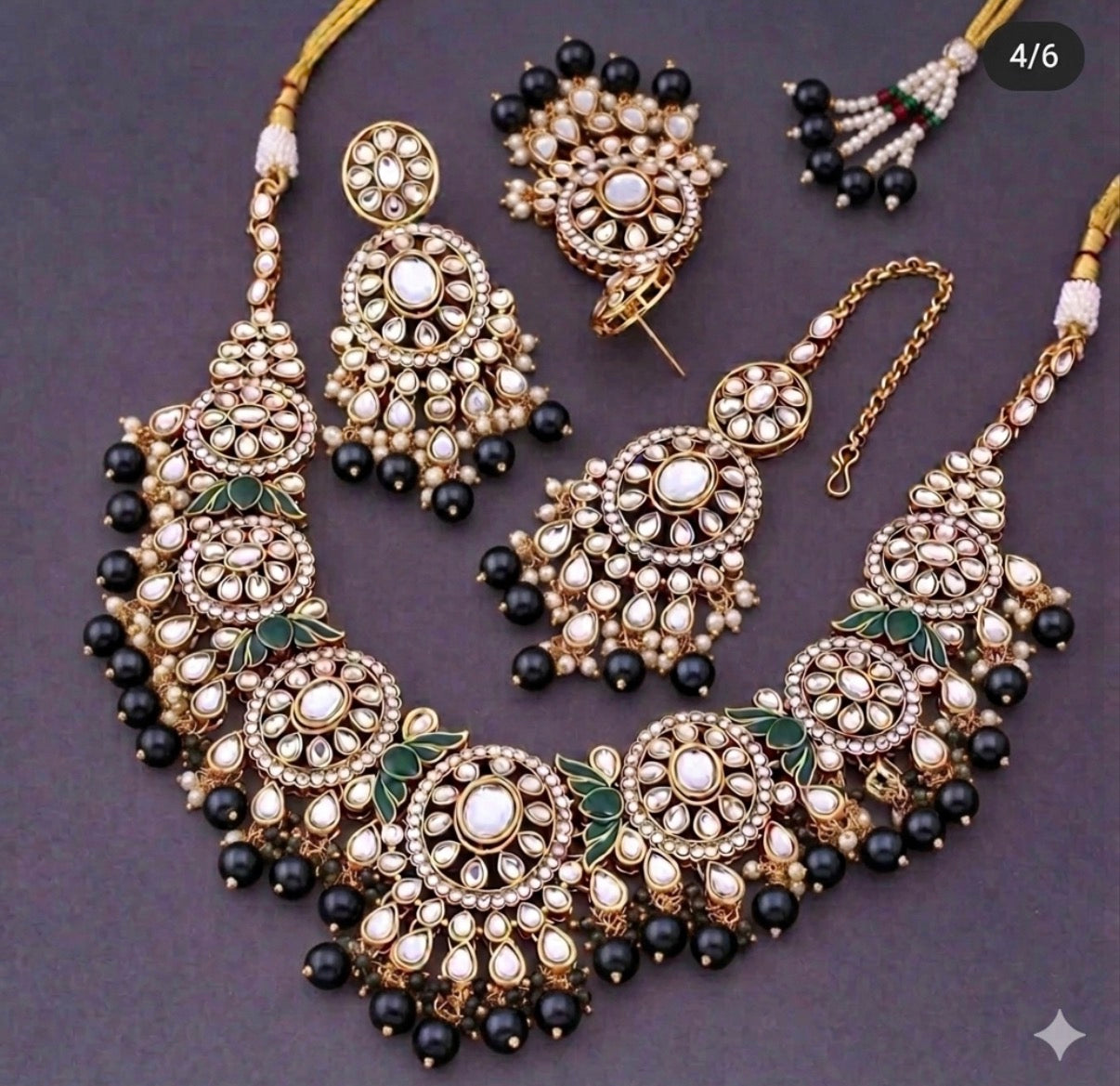 Premium quality kundan set with earrings and tikka