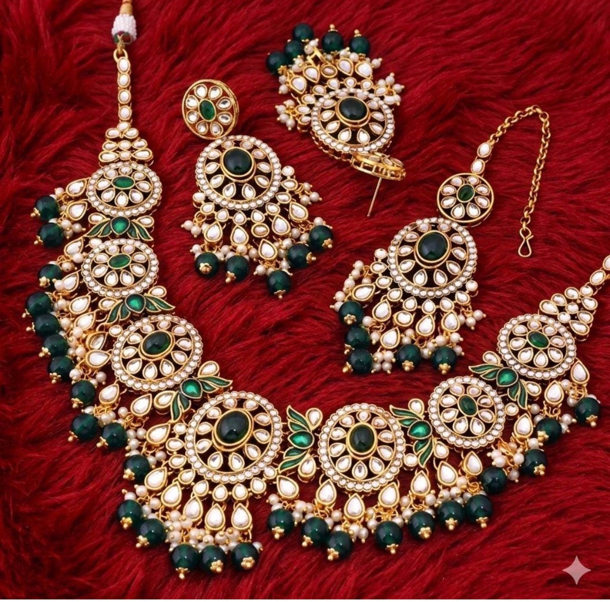 Premium quality kundan set with earrings and tikka