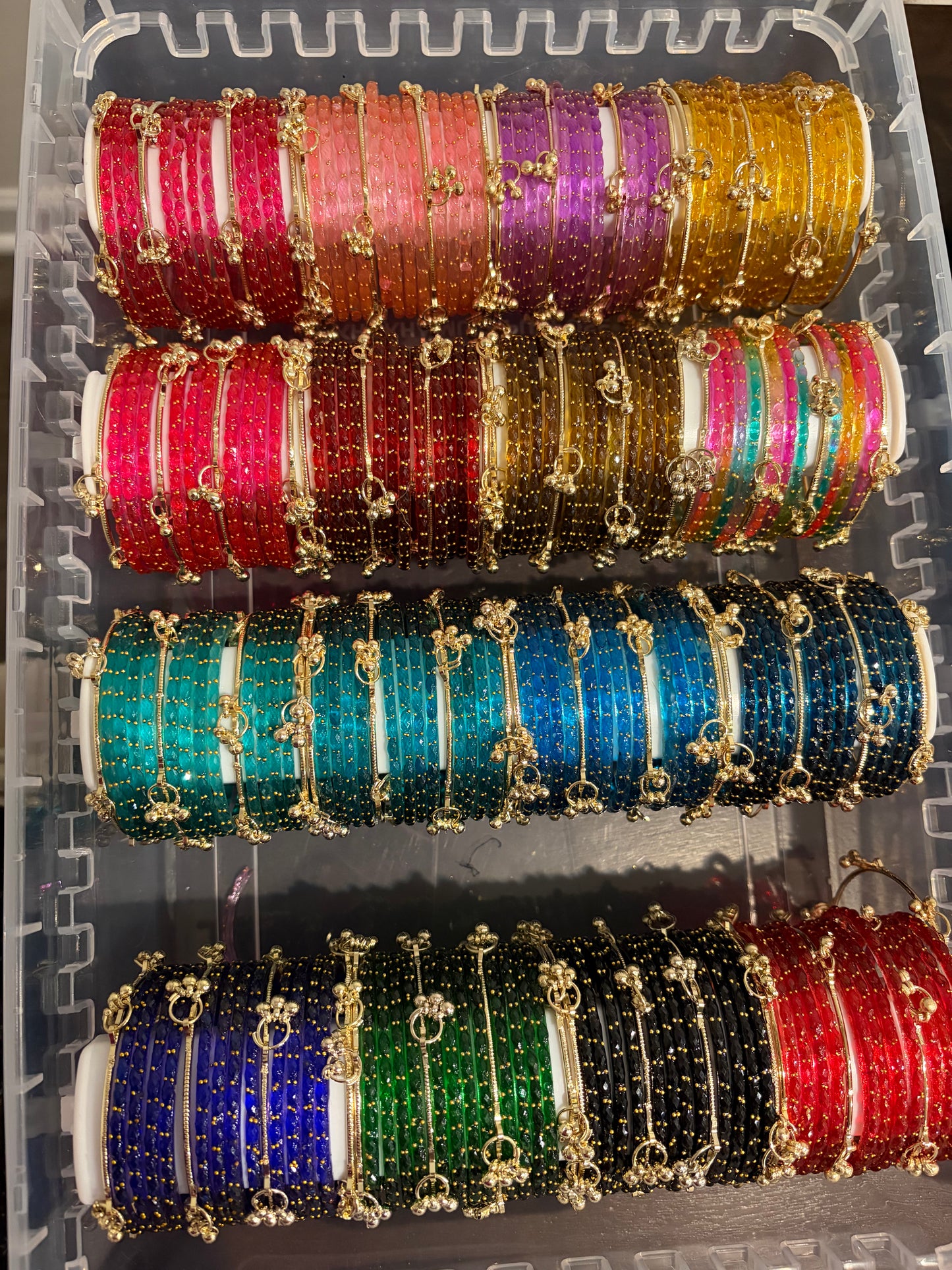 10 sets of Raindrop bangles and 30 Kashmiri bangles size 2.8