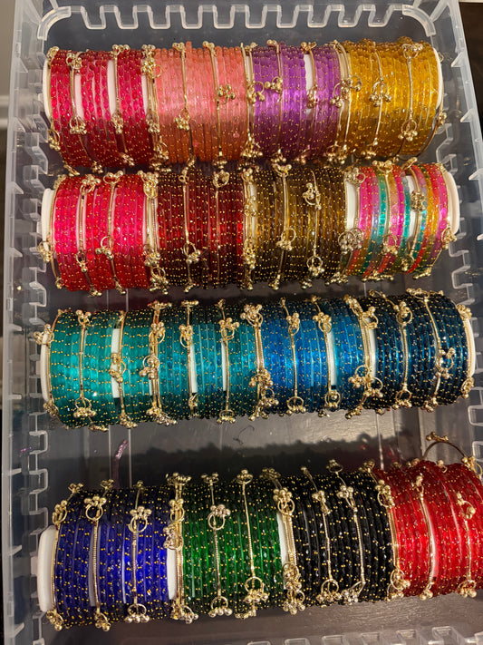 10 sets of Raindrop bangles and 8 Kashmiri bangles (size 2.6) + Free shipping